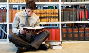 Law student consults books